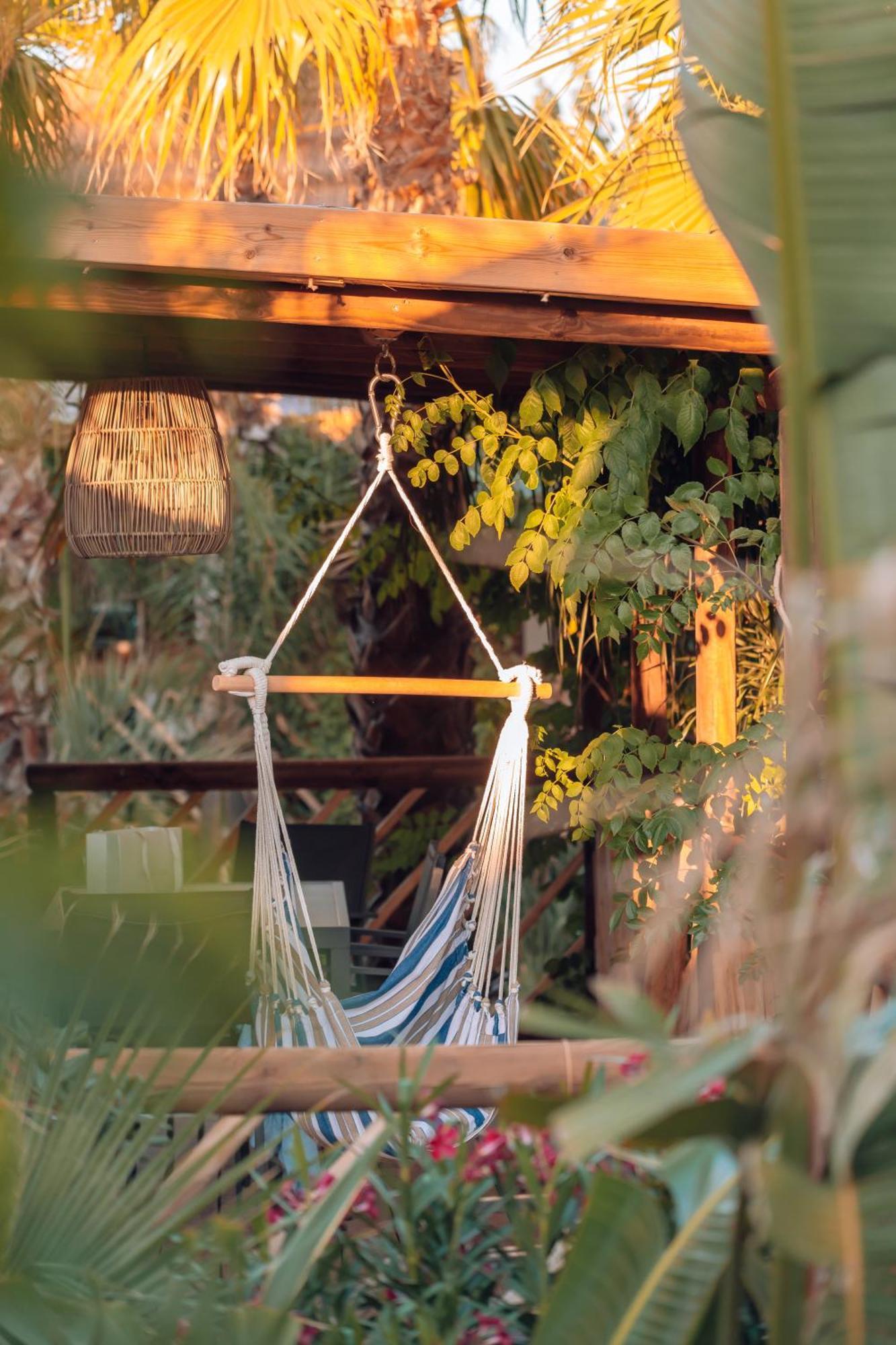 Hotel Toison D'Or Ramatuelle Esterno foto Hammock chair